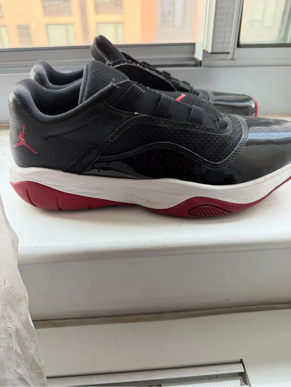 Jordan Black and Red Low-Top Sneakers